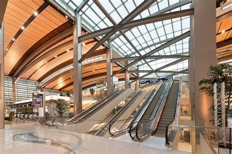 Long Span Steel Roof Framing Provides Airport With Open Spaces Evokes