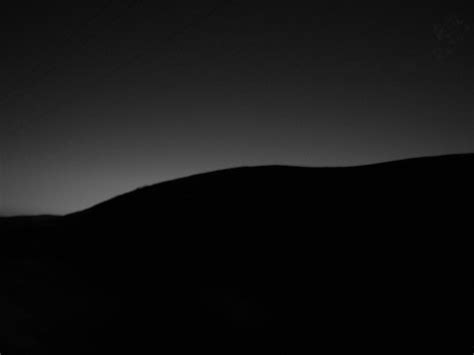 Silhouette Hill Black And White Photograph By Linda Roberts