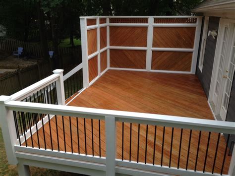 Deep plus bays and stairs—but it's big on features. New Deck with metal railing and privacy screen | Deck ...