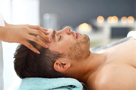 Premium Photo Handsome Man Having Massage In Spa Salon