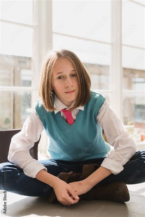 Tween Girl With A Gender Neutral Look Stock Photo Adobe Stock