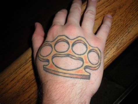 Brass Knuckle Tattoo On Back Hand Tattoomagz › Tattoo Designs Ink