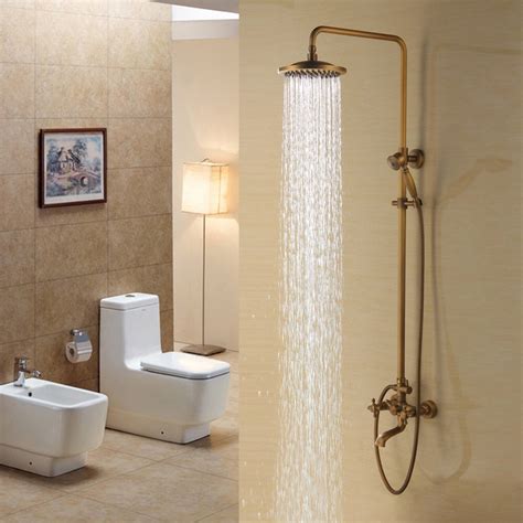 Traditional Rainfall Exposed Shower System With Tub Spout And Handheld Shower In Antique Brass In