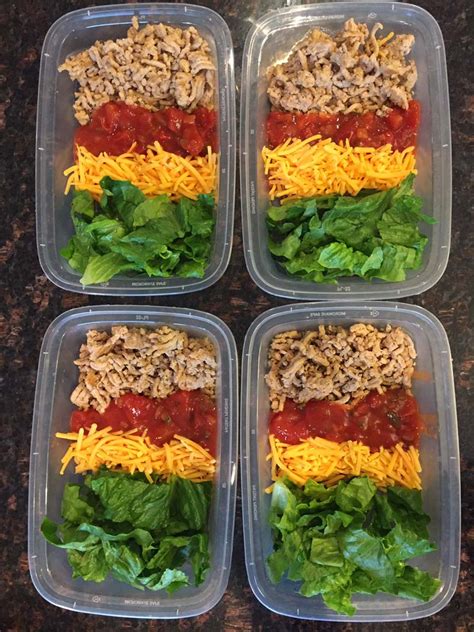 Which of these easy keto lunch ideas for work are you going to prepare first? Keto Taco Salad Meal Prep Bowls - Melanie Cooks