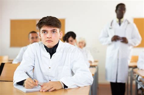 Young Student Listening To Lecture During Professional Medical Training