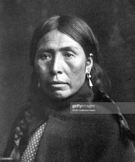 Portrait Of A Native American Woman Her Hair Braided Dark Blanket