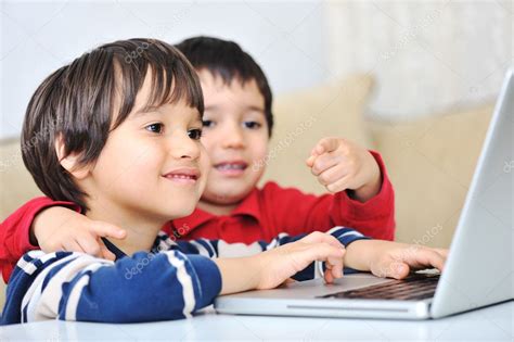 Kids Using Laptop Stock Photo By ©zurijeta 6150601