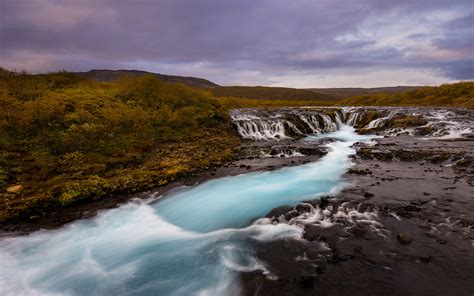 Bruarfoss Small Waterfall With Blue Water In The Souther Part Of