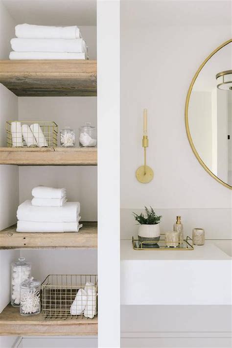 Indeed, this is one cool place that is loved by many people for many unique features. Tall bathroom nook fitted with reclaimed wood shelves ...