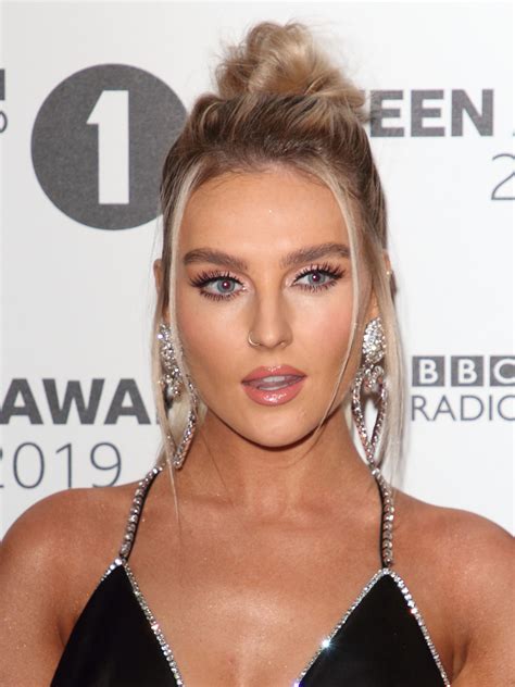 Perrie Edwards Leaves Fans Stunned As She Poses In Sexy Split Leg Gown