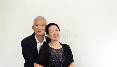 Asian Senior Elderly Couple Happy Business Owner Hugging Each Other