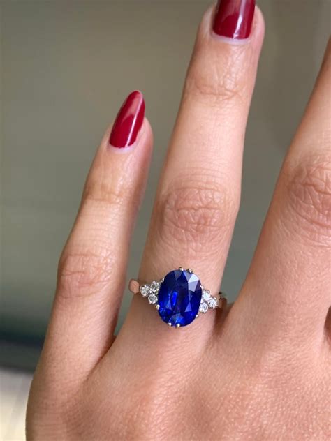 359 Carat Oval Sapphire And Diamond Platinum Engagement Ring For Sale