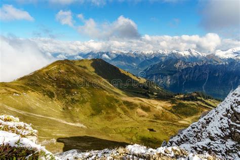 View Of Beautiful Landscape In The Alps With Fresh Green Meadows And