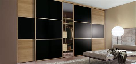 All our wardrobe doors are made to measure to fit your space in a wide range of mirror, glass or wood. Sliding Wardrobes, Wardrobe Designers London by Sky Kitchens