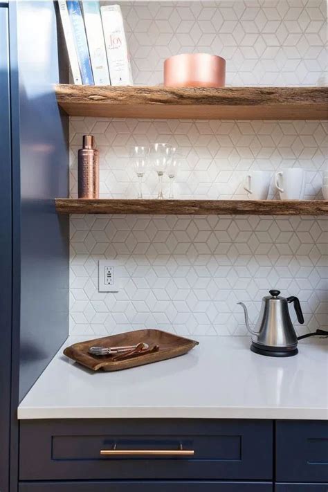 The kitchen renovations team shows how to tile a backsplash with handmade tiles and install a vent above a range. 45 + All About Hexagon Backsplash Kitchen White Cabinets ...
