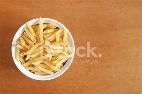Raw Macaroni On Bowl Wooden Table Background Stock Photo Royalty