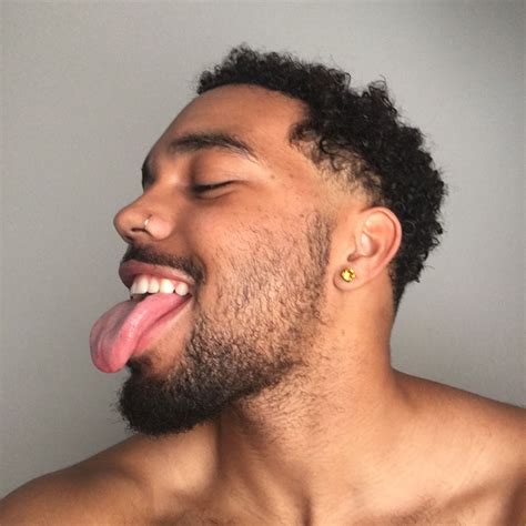 Black Guy With Cool Hair And His Tongue Out