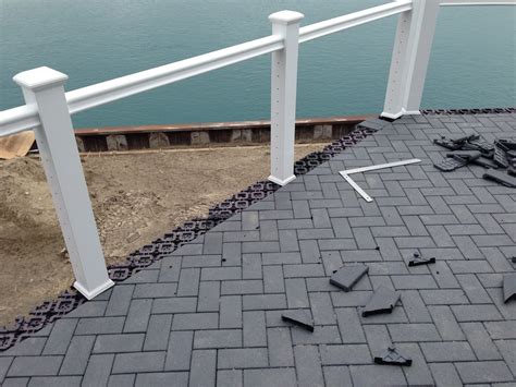 Outdoor Living Low Sloped Roof Decks Composite Pavers And Cable Rail