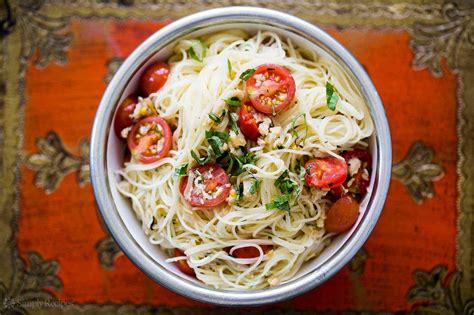 Angel Hair Pasta With Clams Cherry Tomatoes And Basil Recipe