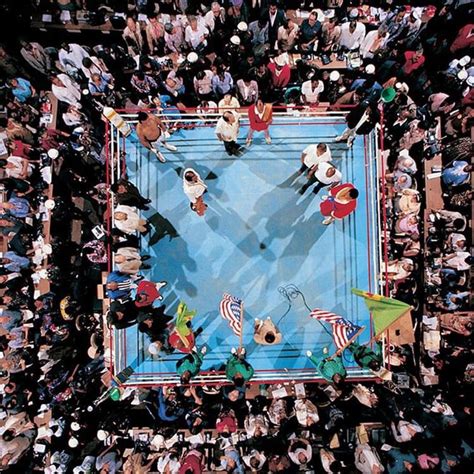 aerial view of muhammad ali and george foreman in the ring during the national anthems before