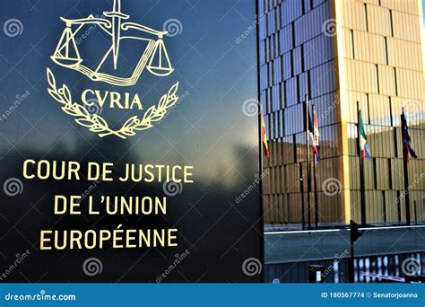 The European Court Of Justice In Luxembourg And Row Of Flags Editorial