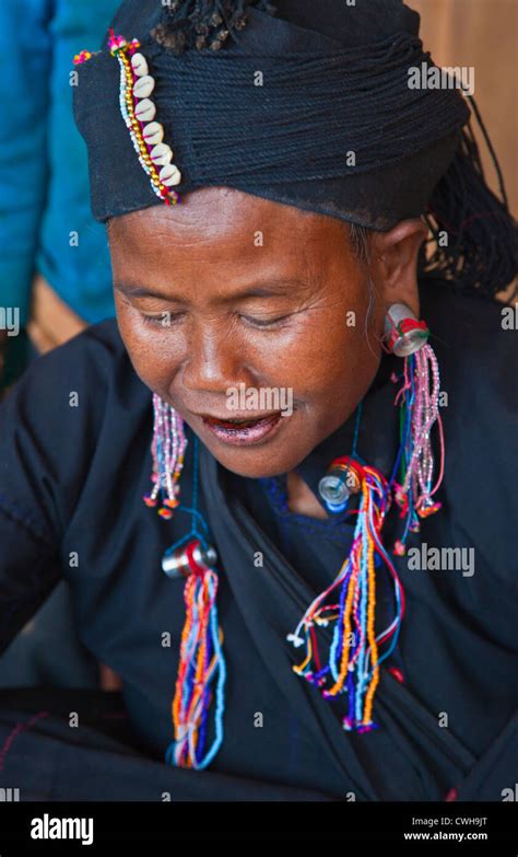 A Ann Tribal Woman In Traditional Dress In Her Village Near Kengtung