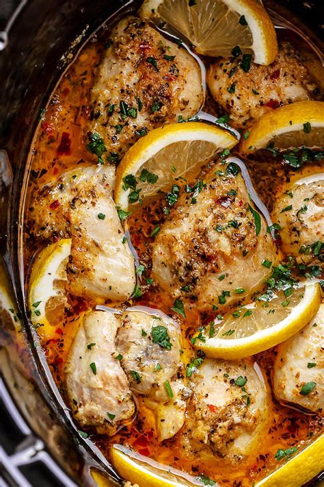 This entire meal is so filling and delicious but light enough to enjoy anytime of the year. Crock Pot Lemon Garlic Butter Chicken Thighs | Chicken ...