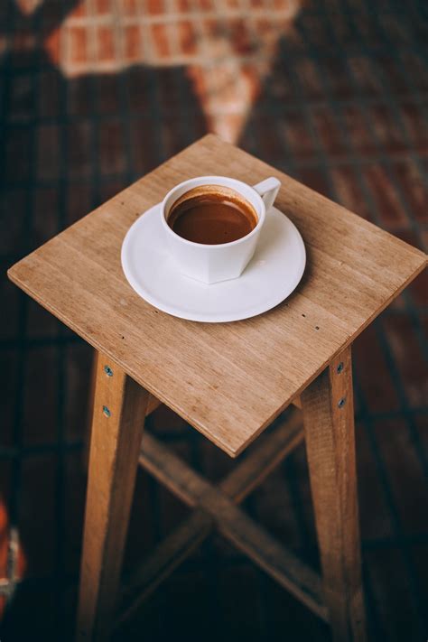 A coffee table is much more than a place for you to rest your wine glass at the end of the long day, it can tie together an entire room and be used as a focal piece to display all sorts. Coffee Cup Table - Picography Free Photo