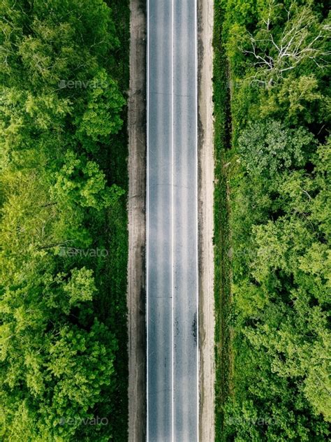 Aerial View Of Empty Road Going Through Green Forest Stock Photo By Nblxer