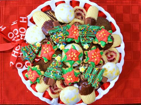 No matter how experienced of a baker you are, if you try to put together a second batch of cookie dough, monitor your baking time for the cookies already in. Christmas Cookie Tray Assembly - Liz Bushong