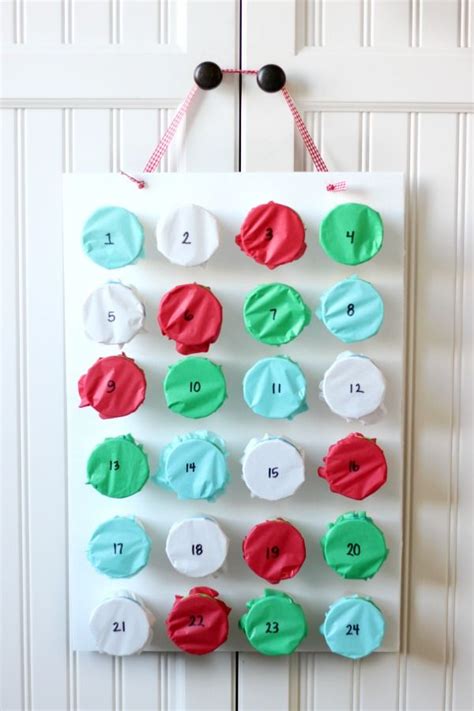 A Simple Diy Advent Calendar Made From Paper Cups And Tissue Paper