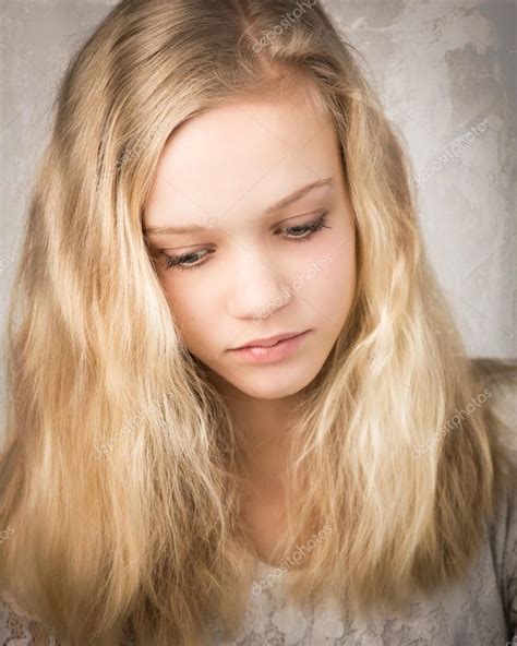 Beautiful Teenage Blond Girl With Long Hair Stock Photo By ©heijo 75835849