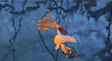 jane on tarzan s back to hang on while she is attacked by an angry baboon on her umbrella