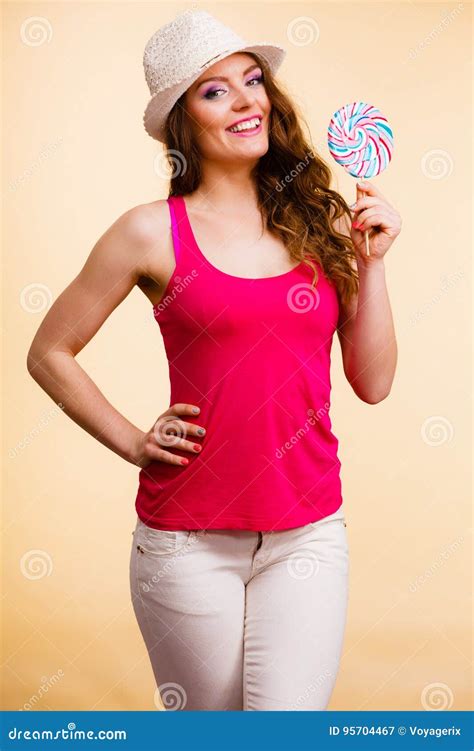 Woman Holds Colorful Lollipop Candy In Hand Stock Image Image Of Positive Dessert 95704467