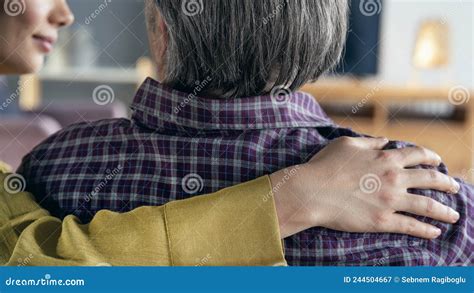Comforting Hand on Shoulder of Man Stock Image - Image of daughter