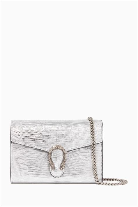 Gucci jewellery positively radiates italian luxe. Shop Gucci Silver Dionysus Metallic Lizard Wallet on Chain ...