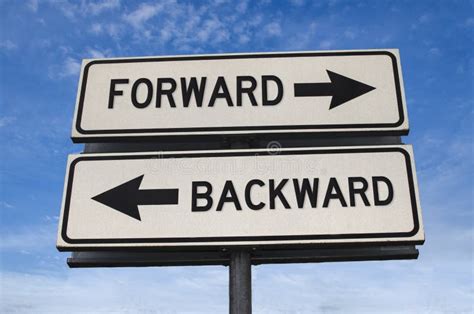 Forward Vs Backward White Two Street Signs With Arrow On Metal Pole