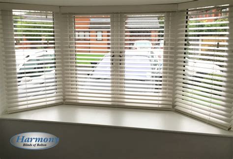 White Wooden Blinds In A Bay Window Harmony Blinds Of Bolton And Chorley