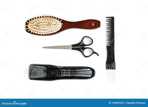 Clippers Scissors And Comb Isolated On White Barber Tools Stock Photo