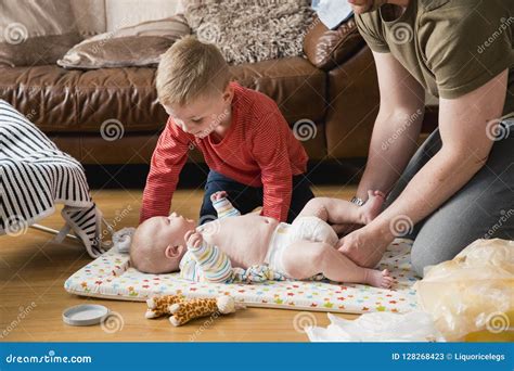 Changing The Babies Diaper Stock Image Image Of Hand 128268423