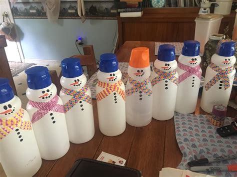 Snowmen Made From Coffee Creamer Bottles And Wasabi Tape Coffee Creamer