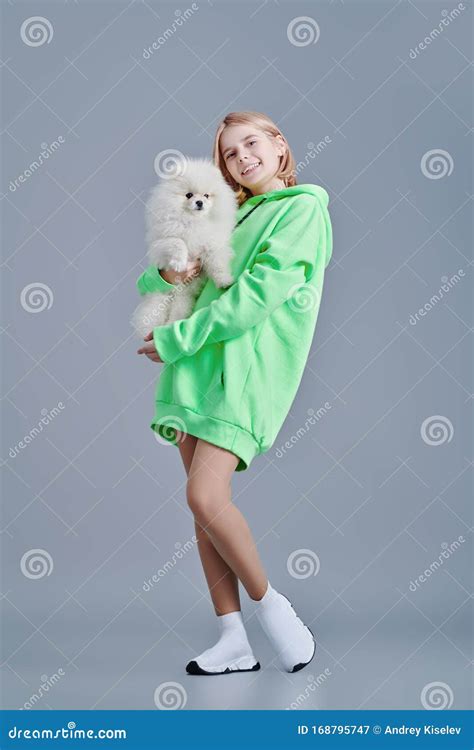 Girl Teenager Holding A Dog Stock Image Image Of Light Love 168795747