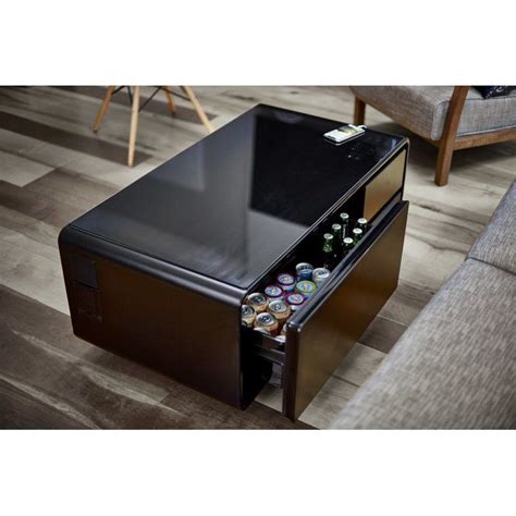 The table has three drawers, one of which is refrigerated. Smart Coffee Table | Furniture, Coffee table with storage ...