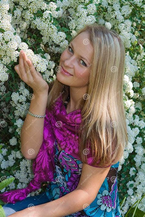 The Fair Haired Girl Sits In A Garden Stock Image Image Of Female