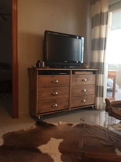 TV stand:Two IKEA Rast night stands turned upside down. Removed
