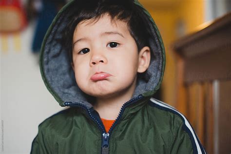 Little Kid Making Sad Face By Stocksy Contributor Lauren Lee Stocksy