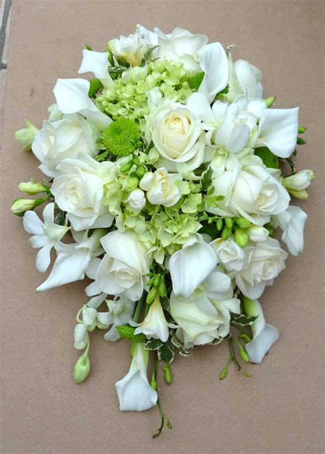 brides shower bouquet in whites and creams flower bouquet wedding bridal bouquets flowers