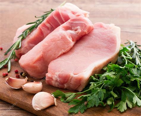 Raw Pork Meat On Wooden Desk — Stock Photo © Victoreus 75211651