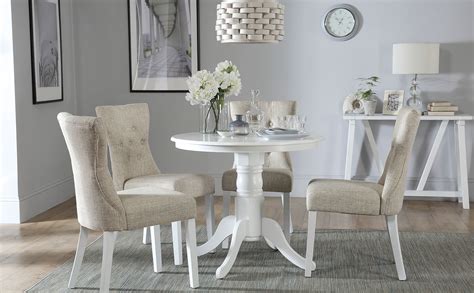 Kingston Round White Dining Table With 4 Bewley Oatmeal Fabric Chairs