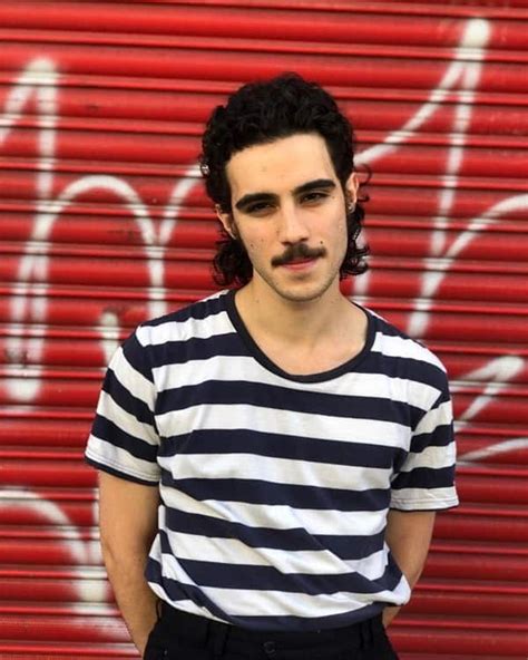 Everybody knows at least one 80s song or movie featuring a cool guy with a big afro on his head, and it's up to you to continue that stereotype. Top 10 Short Mullet Hairstyles for Men - Cool Men's Hair
